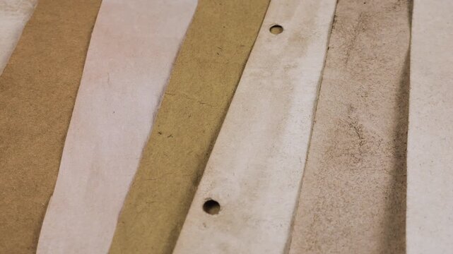 Craft recycling and natural dye textures on old paper pages. Natural handmade paper textures with organic vegetable dye. Creative craft pages for scrapbooking and junk journals. 