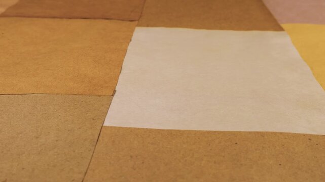 Natural handmade paper background texture for craft and scrapbooking projects. Handmade paper background with natural colours and texture for craft and creativity projects. 