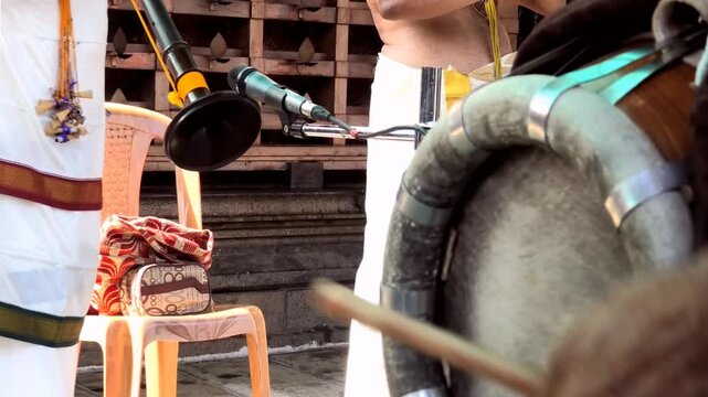 Artists playing Nagaswaram (Nadaswaram) and Thavil (Thakil), a South Indian temple art, during the festival celebration in a temple in Kerala, India