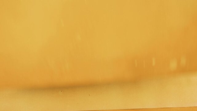 Handmade junk journal background with natural dyed old paper. Sheets of handmade, eco-friendly paper with natural coloring are stacked one by one, creating a grunge.