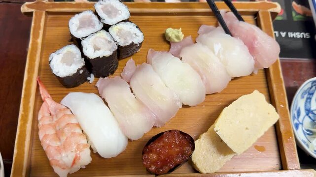 Assorted Japanese Sushi and Sashimi Platter with Chopsticks in Palau