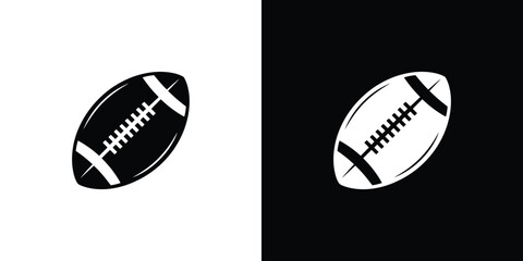 Black and white rugby balls on split background sports equipment