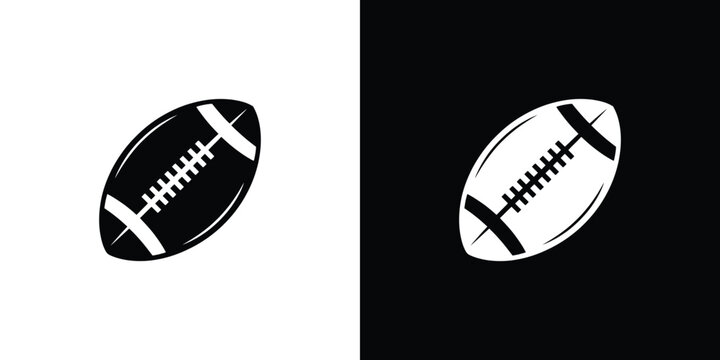 Black and white rugby balls on split background sports equipment