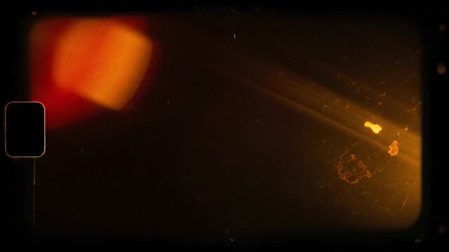 Authentic old film burn overlay with abstract dark canvas background intense warm light leaks spreading from frame edges natural celluloid burn patterns glowing holes irregular borders textured film g