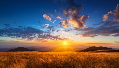 Fototapeta premium Sky Dusk Dramatic Background Summer Season Gold Sunset Landscape Nature Light Clouds Blue Orange Yellow Color Colorful Sunrise Sun Cloud Beauty Mountain Horizon Beautiful Sunlight Weather Sunshine