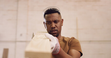 Carpenter, man and inspection in factory with woodwork, remodeling project and furniture...