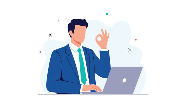 Professional young businessman in a dark blue suit works at a laptop and makes an okay gesture against a clean background.