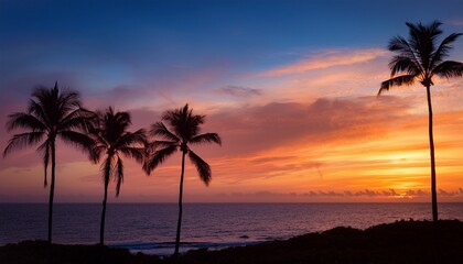 Obraz premium Tropical Palm Trees Silhouetted Against A Vibrant Sunset Over The Ocean Twilight Coast