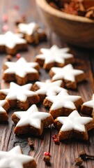 A wooden table with star-shaped cookies and a bowl