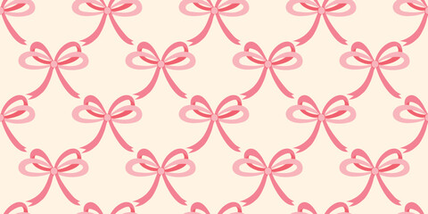 Obraz premium Seamless pattern of pink bows on beige background. Girly ribbon print for textiles, wallpaper, packaging and paper. Vector graphics