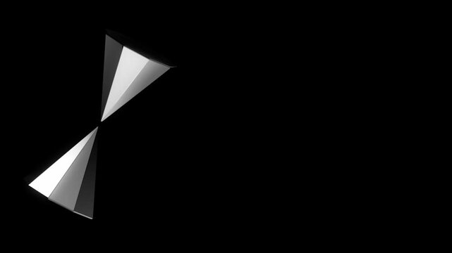 Two angular glossy black geometric forms floating on a dark background with strong highlights and shadows creating a modern minimalist 3D abstract design