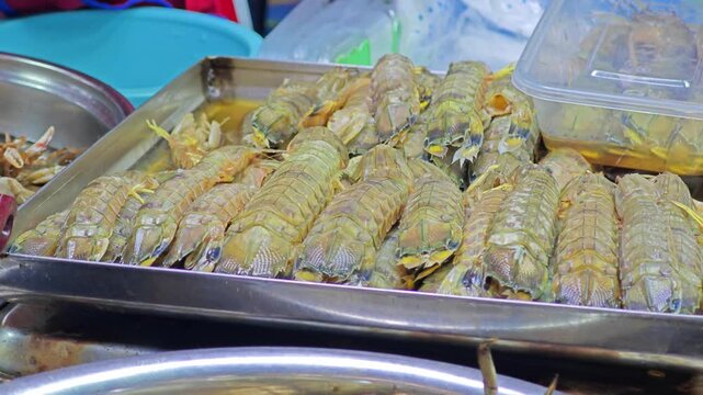 Mantis shrimps in market on ice shelf.