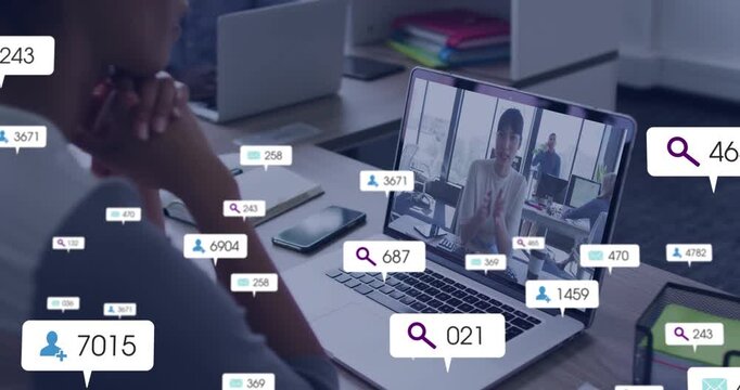 Female viewer listening at desk, incoming badges growing over laptop, showing marketing data