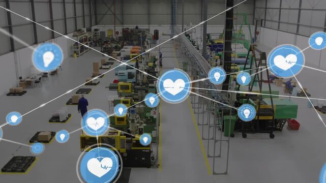 Operators in plant packing while heart icon spawning nodes and lines covering floor tracking yield