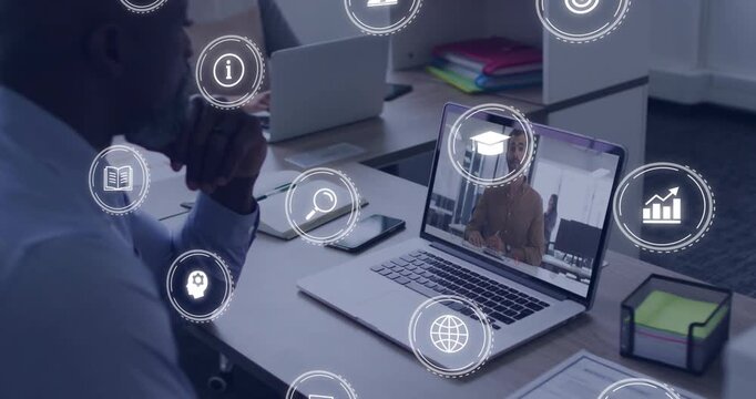 Mature man watching laptop, remote presenter speaking, icons multiplying across frame for business