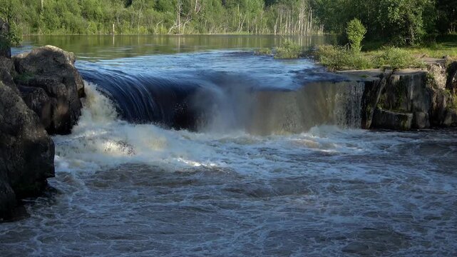 View on Voitsky Padun waterfall on the Vyg River, sunny July day. Karelia, Russia