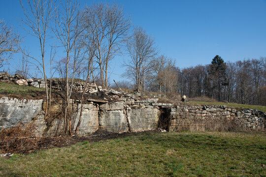 The 'giasare' of Lessinia are ancient stone-lined pits once used to store winter ice, preserving food through summer in the cool hills of the Venetian Prealps. In the Verona area.