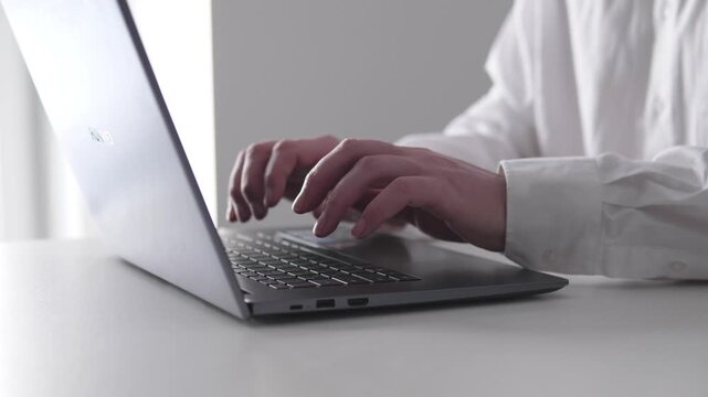 Typing On Laptop For Analysis. Focus On Hands Keyboarding For Data And Business Tasks. Caucasian Hands Meticulously Working On Laptop During Data Processing And Analysis Session