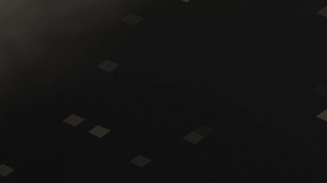 Abstract motion blur effect on a dark background with scattered square shapes in random motion