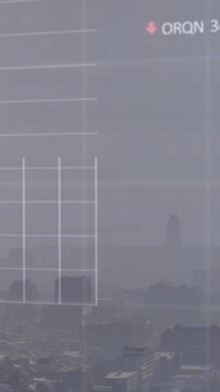 Vertical video: Glass activating overlay on hazy skyline, graphs rising, settling, showing markets