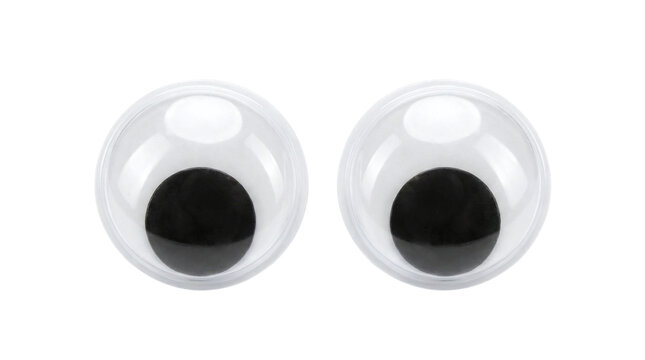 Pair of funny plastic craft googly eyes on a transparent background