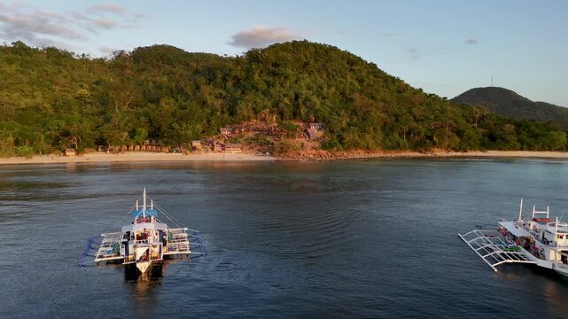 Drone aerial view of KMAAL campsite in Linapacan near Coron in The Philippines.