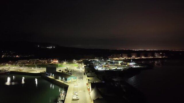 Aerial Night View of Howth Harbour in Dublin Bay, Ireland &ndash; 4K 60fps Drone Footage