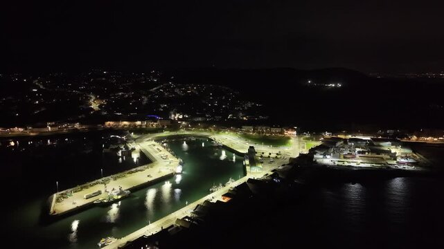 Aerial Night View of Howth Harbour in Dublin Bay, Ireland &ndash; 4K 60fps Drone Footage