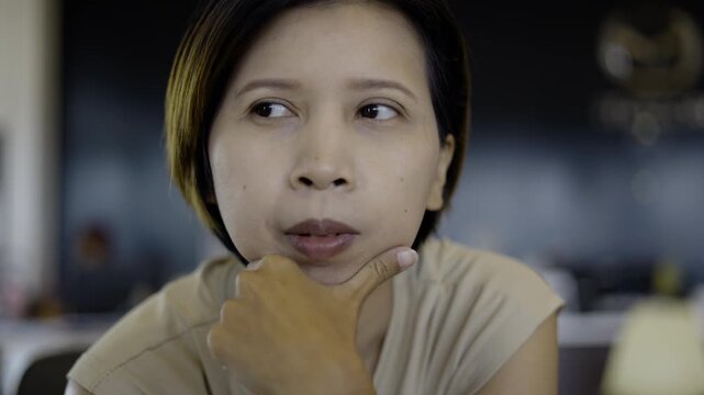 Asian Woman Chatting Casually To Camera, A natural and relatable video of an woman talking to camera with warm expression, perfect for lifestyle and social media content creation.