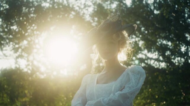 Backlit Woman Wearing Vintage Clothing In Nature. Serene Scene Of Lady In Classic Dress Under Sunlight