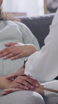 Office, therapist and comfort for pregnant woman, hands and advice for perinatal anxiety and stress. People, psychology and support for childbirth fear, pregnancy or help for mental health in clinic