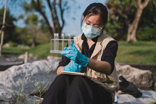 In science, researchers conduct careful experiment and testing on each liquid sample, taking note of water behavior to deepen analysis, research, and understanding of nature and environment.