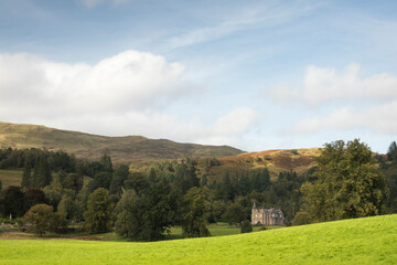 Sunny Scottish countryside landscape with hills in the background © Ville Kangas