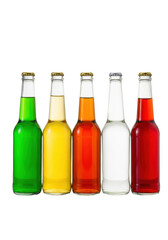 Five identical clear glass beverage bottles, four filled with vibrant craft soda (green, yellow, orange, red) and one empty, shiny golden caps, white reflection surface Concept for gourmet product