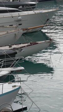 A boat docked at Port Hercule in Monaco during the winter season