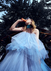 Fototapeta premium woman in a blue dress