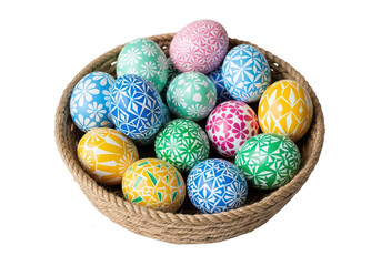 Colorful assortment of small eggs nestled inside a decorative woven basket.
