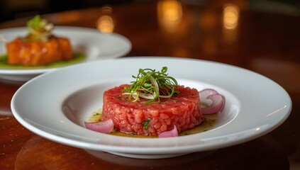 Herbed raw tuna tartare with pickled onions, an upscale seafood starter