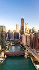 Obraz premium High-angle view of Chicago's downtown skyline, with a river and bridges