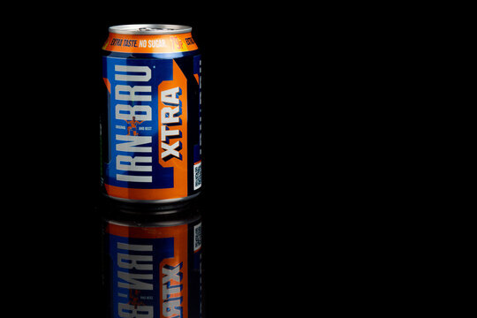 A Can of Irn Bru Xtra against a black background