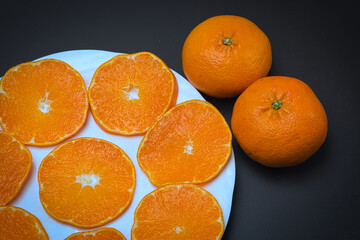 皮が薄くてむきやすく、果汁たっぷりで本当においしい愛媛県産の柑橘類・甘平の輪切り