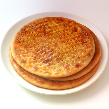 Golden Flatbreads on Plate: Three perfectly baked, golden flatbreads rest invitingly on a pristine white plate, promising a moment of pure culinary delight.