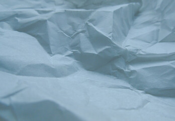 Fototapeta premium Crumpled Blue Paper Texture Overlay – Realistic Wrinkled Paper Background