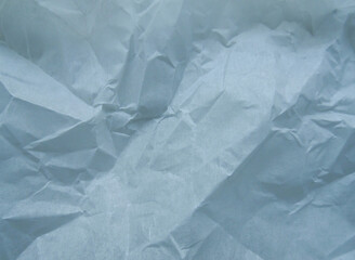 Obraz premium Crumpled Blue Paper Texture Overlay – Realistic Wrinkled Paper Background
