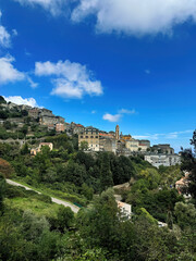 Naklejka premium Mountain village of Cervione in the Monte San Petrone massif in Corsica in summer
