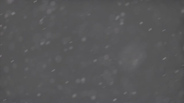 Slow motion falling snow particles on background, cinematic winter atmosphere with dense blizzard effect, swirling flakes, bokeh for overlays. ProRes 422, 10 bit ungraded C-LOG2, Slow motion video.