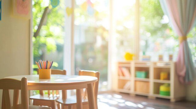 Sunny preschool classroom with table and chairs