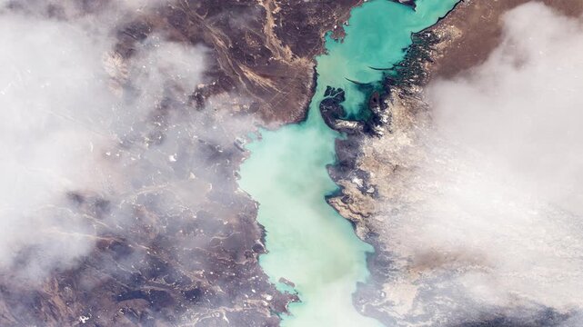 Flying over Lake Balkhash Kazakhstan turquoise waters view from space satellite view based on Nasa imagery