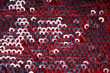 Sequin fabric macro texture, color shiny carnival background