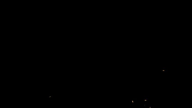 Double burst golden confetti explosion falling in super slow motion on a black screen background with smooth alpha animation, perfect for festive celebrations and event intro videos in 4K
